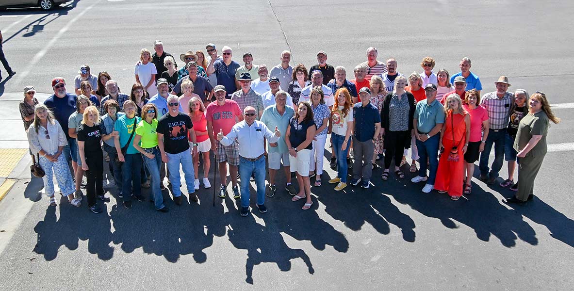 Rexburg Mayor Jerry Merrill, center, with people who graduated around the time of the Teton flood. | Courtesy Daniel Andrus
