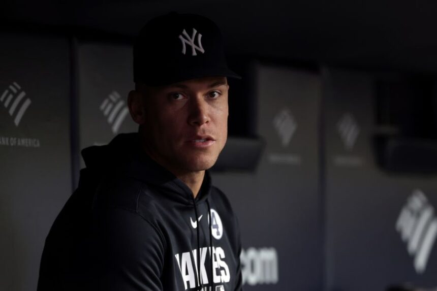 New York Yankees right fielder Aaron Judge (99) looks on from the dugout during the seventh inning of a baseball game against the Cleveland Guardians, Tuesday, June 2, 2026, in New York. (AP Photo/Adam Hunger)