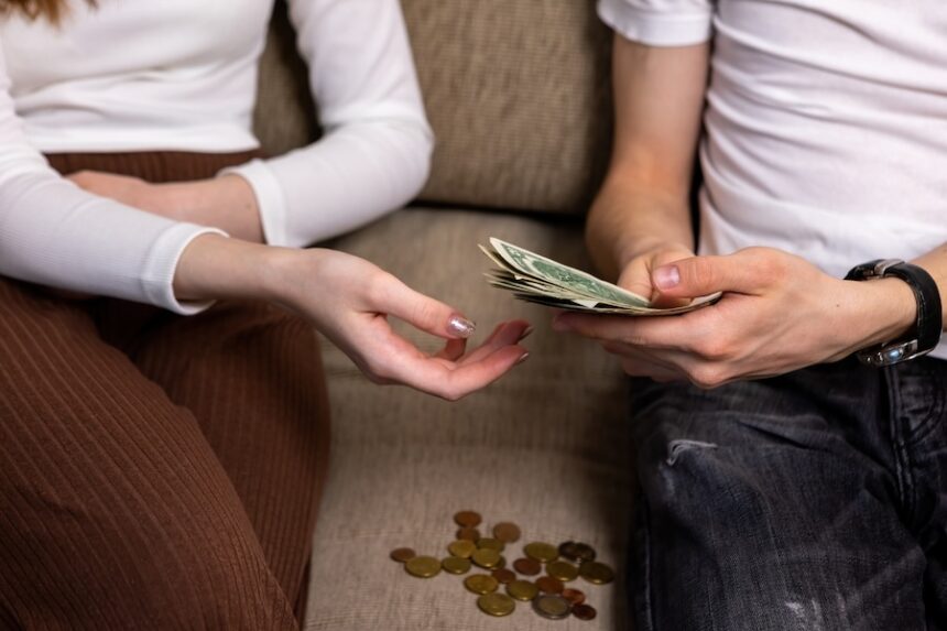 money changing hands between two people indoors 2026 01 07 01 28 08 utc