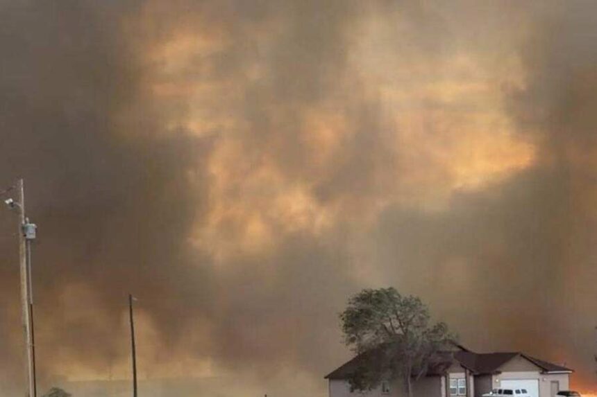 A fire in Mountain Home last week that destroyed several homes and caused smoky skies. | Gene D.