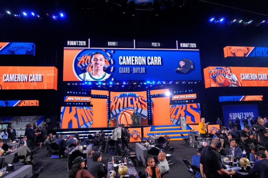 in the first round of the NBA basketball draft, Tuesday, June 23, 2026, in New York. (AP Photo/Yuki Iwamura)