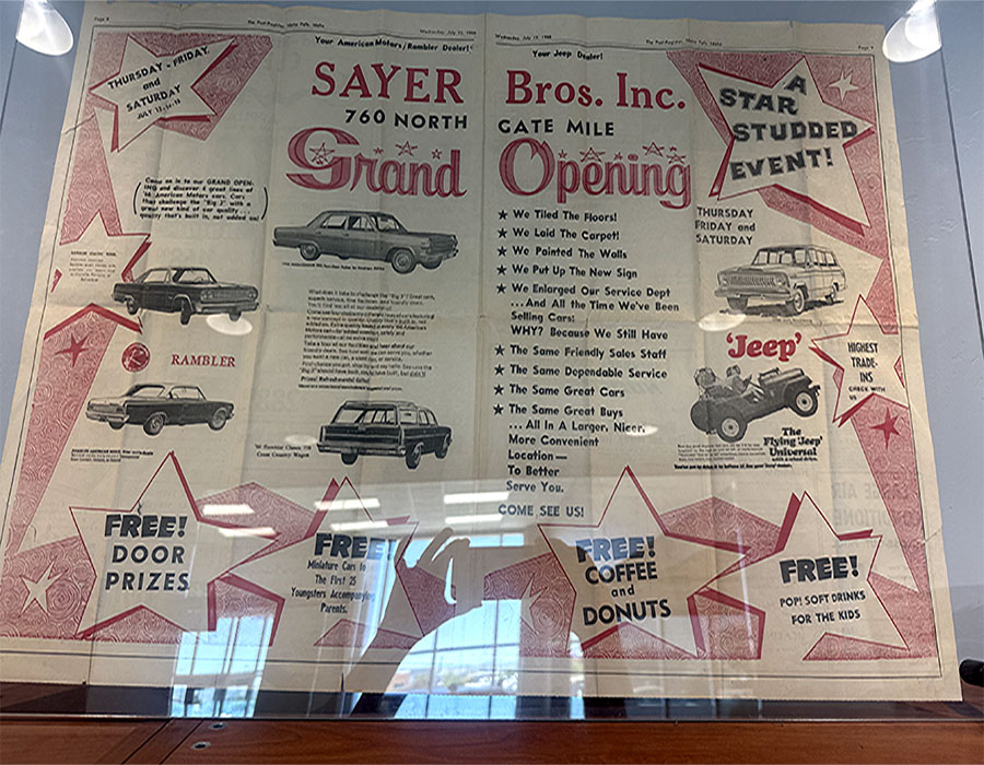 An advertisement from 1966 that talks about Sayer Bros. Inc. having a grand opening event at their Northgate Mile location.