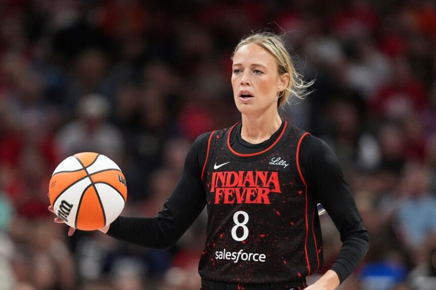 FILE - Indiana Fever guard Sophie Cunningham (8) plays against the Dallas Wings in the second half of a WNBA basketball game in Indianapolis, Aug. 12, 2025. (AP Photo/Michael Conroy, File)