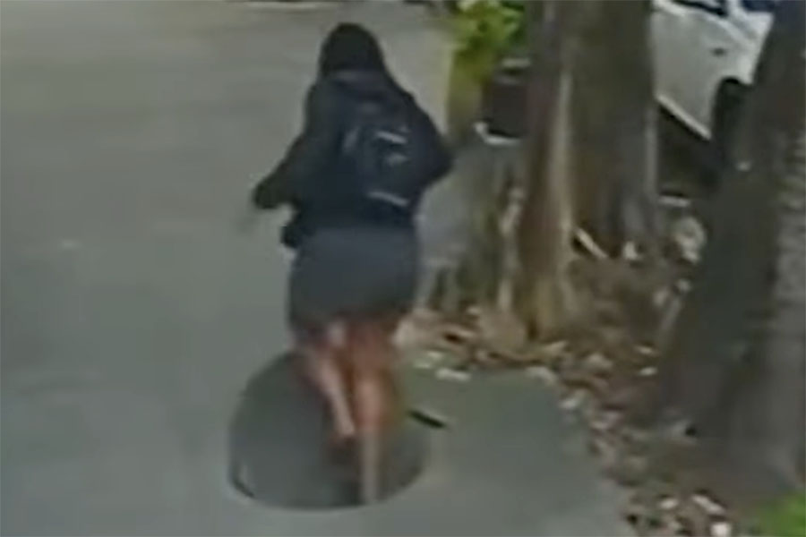 You have to see this! Woman falls into manhole after stepping on loose cover