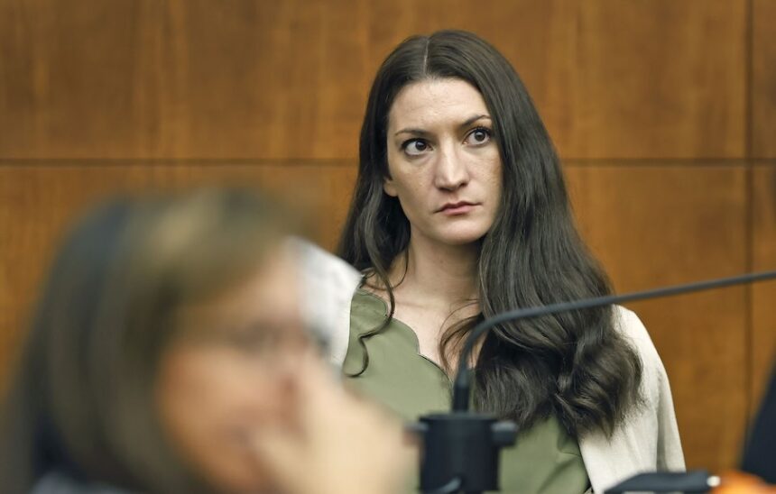 Lindsay Clancy waits for Judge Sullivan to call a prospective jury member into court on Wednesday, July 22, 2026.