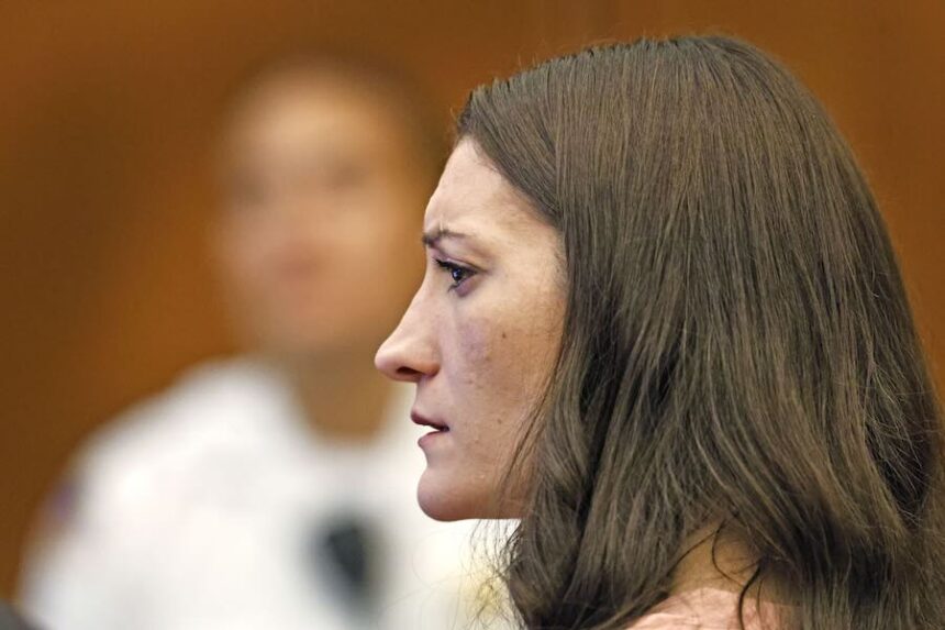 Lindsay Clancy watches as her ex Husband Patrick Clancy takes the witness stand.