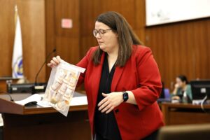 Prosecutor Jennifer Sprague of the Plymouth County DA's office enters a bag of prescription pills into evidence that were prescribed to Lindsay Clancy, many of the pills were never taken according to Sprague.