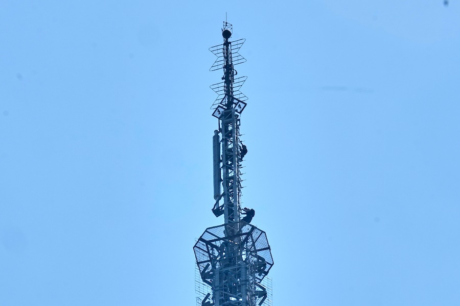 Two people descend the spire of the Empire State Building, in New York, Wednesday, July 1, 2026.