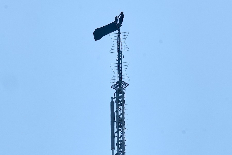 A person is shown atop the spire of the Empire State Building, in New York, Wednesday, July 1, 2026.