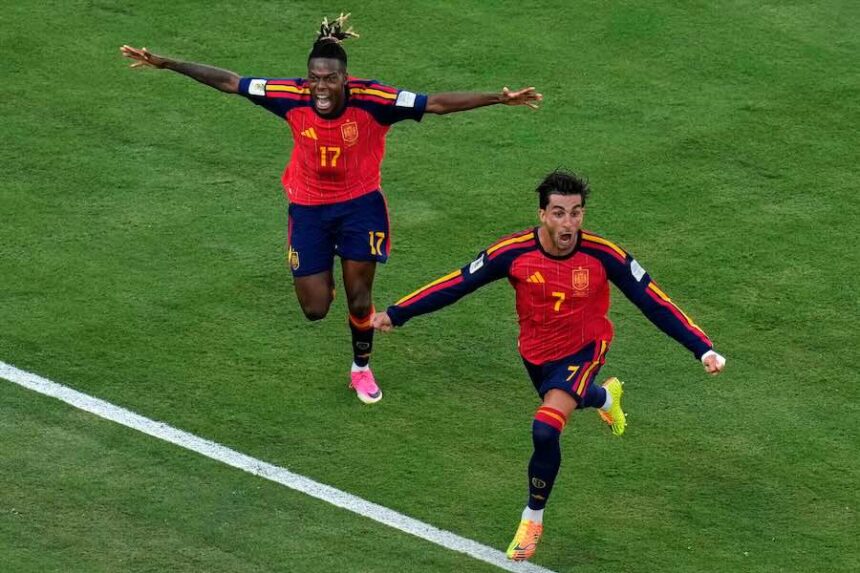 Spain's Ferran Torres (7) celebrates after scoring the opening goal of his team during the World Cup final soccer match between Spain and Argentina in East Rutherford, N.J., near New York, Sunday, July 19, 2026.