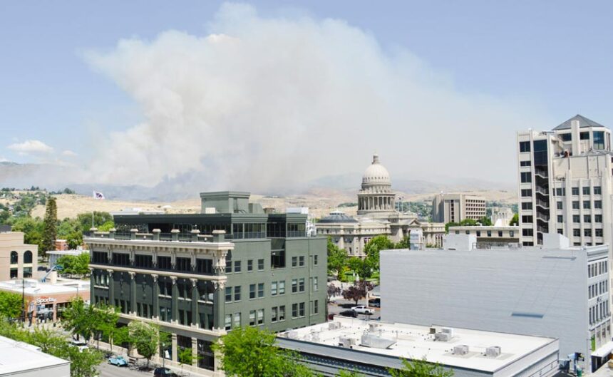 The Claremont Fire burns in the Boise foothills behind the Idaho Capitol building and downtown on July 6, 2026. The Idaho Department of Lands is among several fire agencies working on the fire. | Laura Guido, Idaho Capital Sun