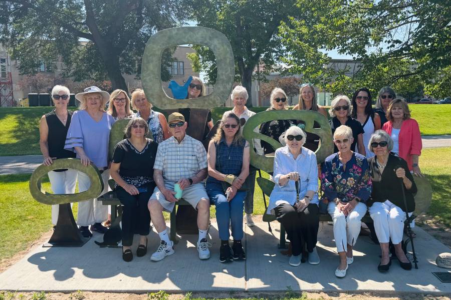 Community members gathered to witness the installation of bench honoring Carrie Scheid Idaho Falls Art Council