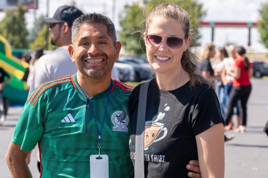 Juan Contreras standing with his wife by his side as they smile on a sunny day. | Courtesy Photo of Juan Contreras' Facebook page.