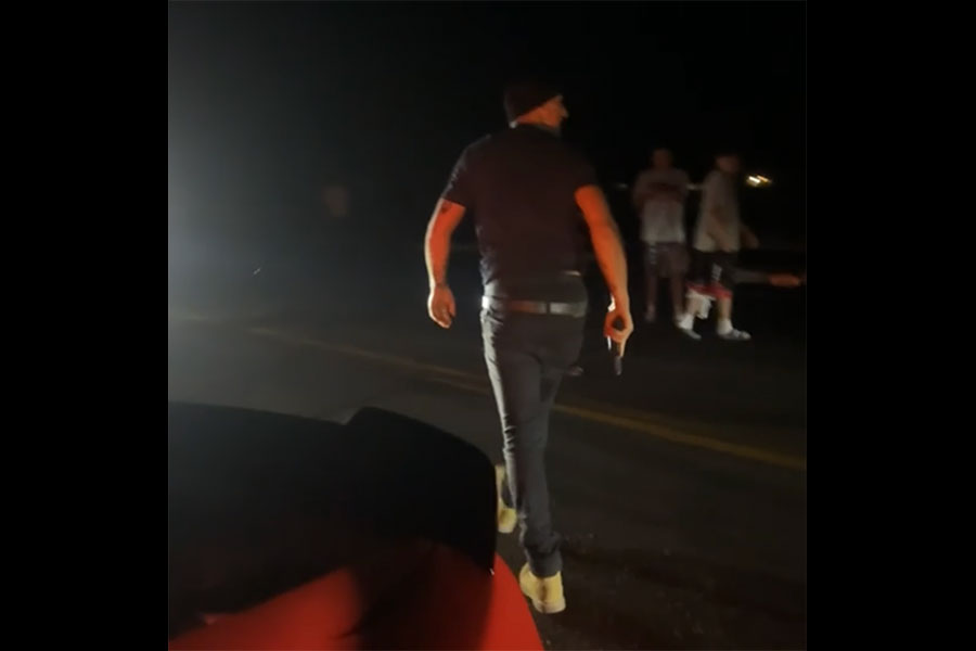 Screenshot of videos sent to EastIdahoNews.com that show Shane Michael Sutton walking away from the group of teens at McCowin Park holding a pistol in his right hand. | Courtesy Yaser Elabed