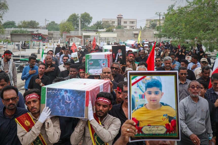 Mourners carry the coffins containing additional remains of victims identified through DNA testing during funeral ceremonies in Minab, Iran, Tuesday, July 22, 2026, nearly five months after they were killed in the Feb. 28 strike on the Shajareh Tayyebeh School. | Razieh Poudat, ISNA via Associated Press