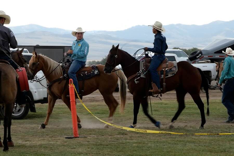 Cowboys ride by on their horses at a press event for the 2026 War Bonnet Rodeo at Sandy Downs, on Wednesday, July 29, 2026, in Idaho Falls.
