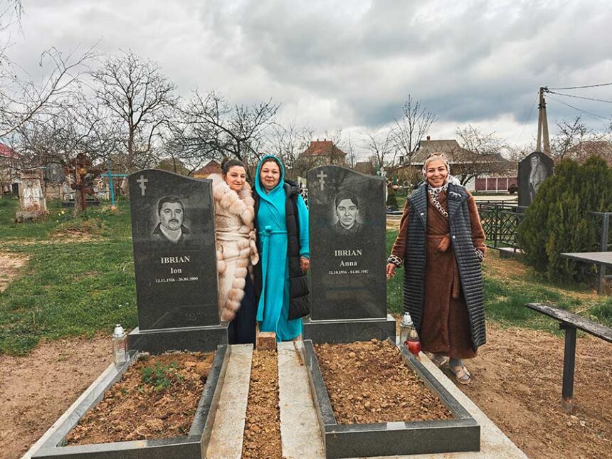 The Ibrian sisters at their parents graves at the cemetery. | Courtesy of McKenna Christensen