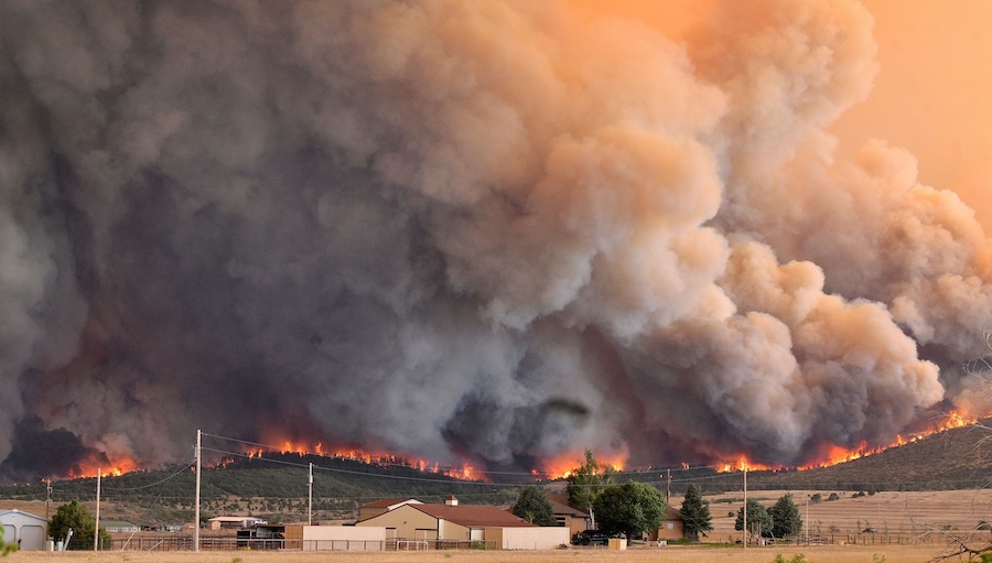 Fast-moving wildfires scorch thousands of acres across the West, and there’s more danger ahead
