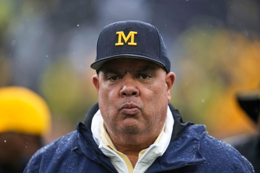 FILE - Michigan athletic director Warde Manuel watches against Indiana in the second half of an NCAA college football game in Ann Arbor, Mich., Oct. 14, 2023. (AP Photo/Paul Sancya, File)