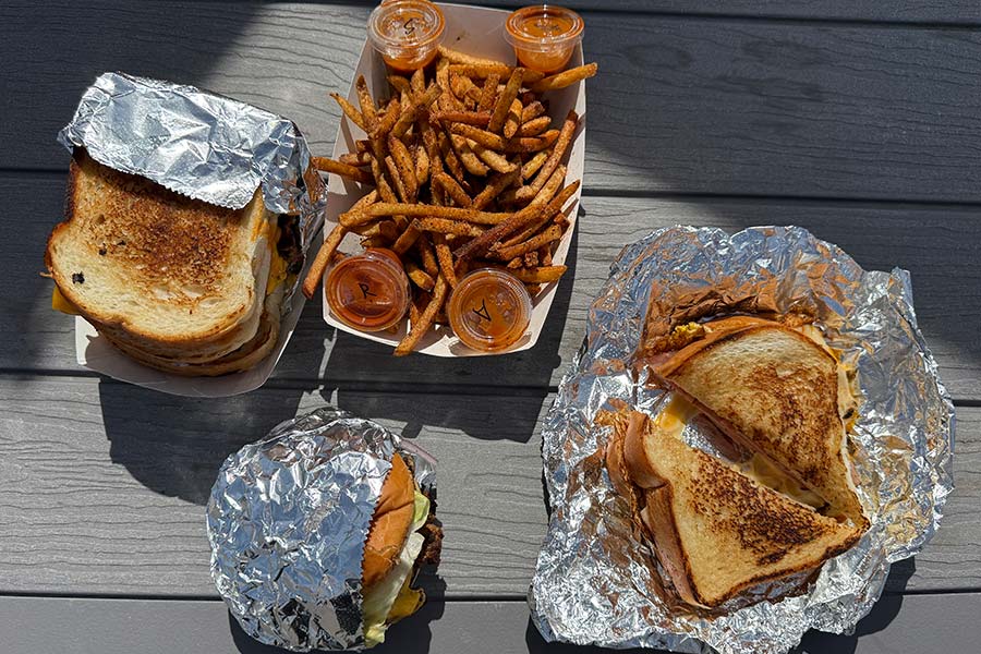 Meet the double burger stuffed between two grilled cheeses