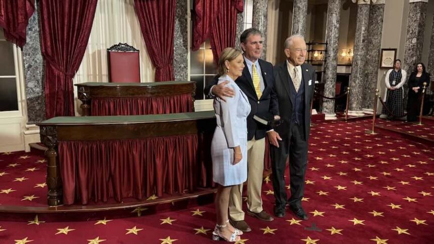 U.S. Sen. Darline Graham, left, Republican of South Carolina, participates in a reenactment of her swearing-in at the U.S. Capitol on July 14, 2026, alongside her husband, Larry Nordone, and Iowa GOP Sen. Chuck Grassley, president pro tempore of the Senate.