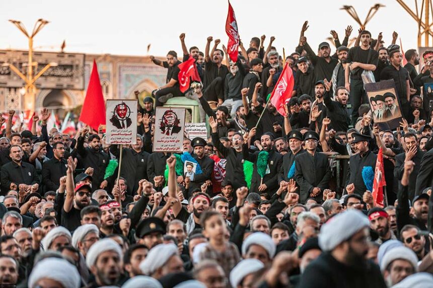 In this photo released by Iran's Supreme Leader's office, mourners chant and raise their fists during the final funeral ceremony for the late Iranian Supreme Leader Ayatollah Ali Khamenei at the Imam Reza Shrine before his burial in Mashhad, northeastern Iran, Thursday, July 9, 2026. (Office of the Iranian Supreme Leader via AP)