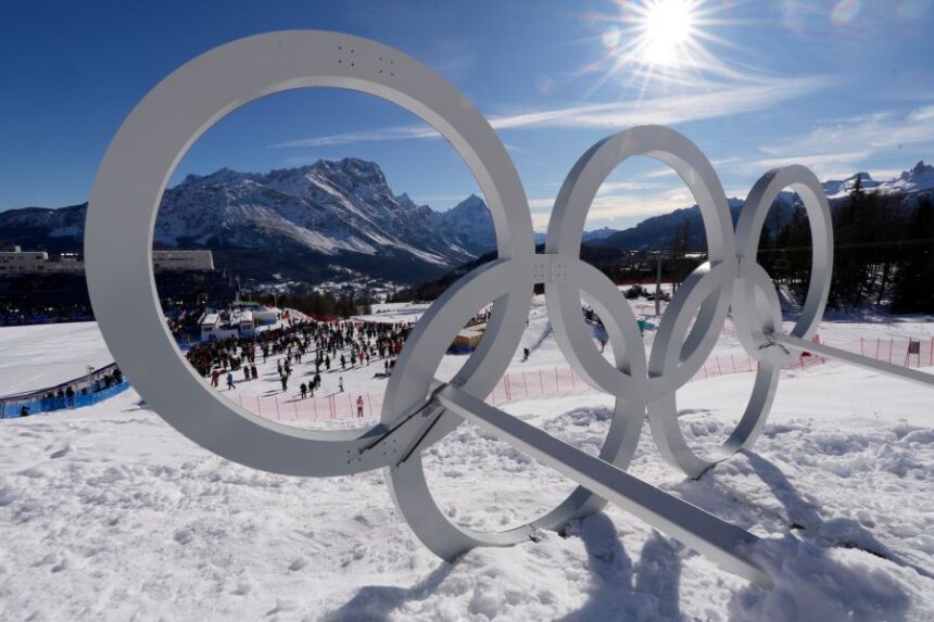 FILE - Olympic rings are seen at the 2026 Winter Olympics in Cortina d'Ampezzo, Italy, Feb. 8, 2026. (AP Photo/Robert F. Bukaty, File)