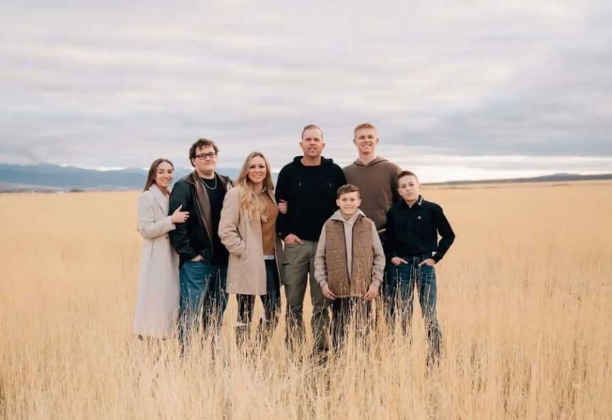 Katrina Long (third from left) and her husband, Spencer Long (center) are pictured with their family. Spencer, Katrina and their three sons died Friday, July 18, 2026, after they were apparently caught up in a flash flood at a Wayne County, Utah, campground.