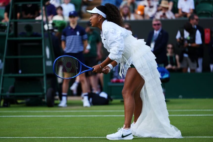 Naomi Osaka of Japan warms up before her second round women's singles match against Anastasia Gasanova of Russia at the Wimbledon Tennis Championships in London, Wednesday, July 1, 2026.(AP Photo/Kirsty Wigglesworth)