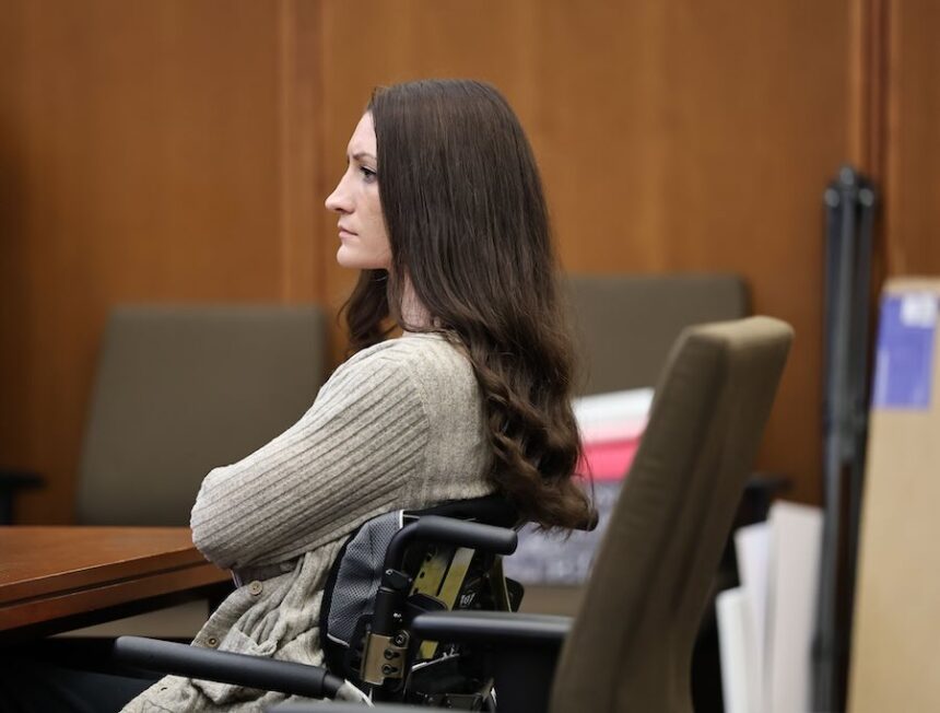 Lyndsay Clancy listens to the testimony of Dr. Gregory Saathoff about her mental state when she murdered her three children in 2023, during Clancy's trial on Wednesday, Aug. 26, 2026, at the Plymouth Superior Court in Plymouth, Mass.