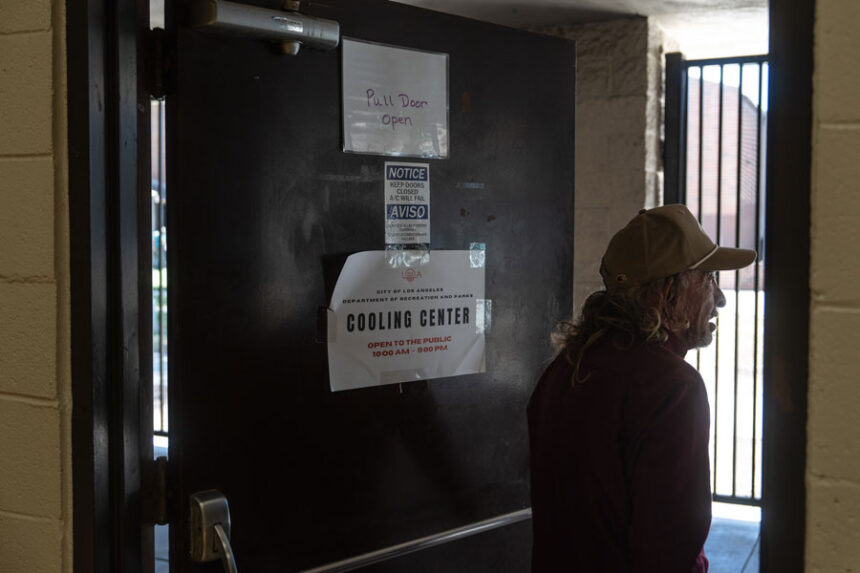Daniel Aragonez leaves a cooling center in Los Angeles, Friday, July 31, 2026. | Jae C. Hong, Associated Press