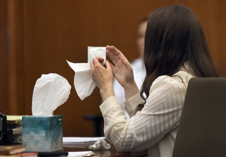 Lindsay Clancy grabs a tissue after witness Elaine Rossi, the nanny to the Clancy children, testified during her murder trial at Plymouth Superior Court in Plymouth, Mass., Wednesday, Aug. 5, 2026.