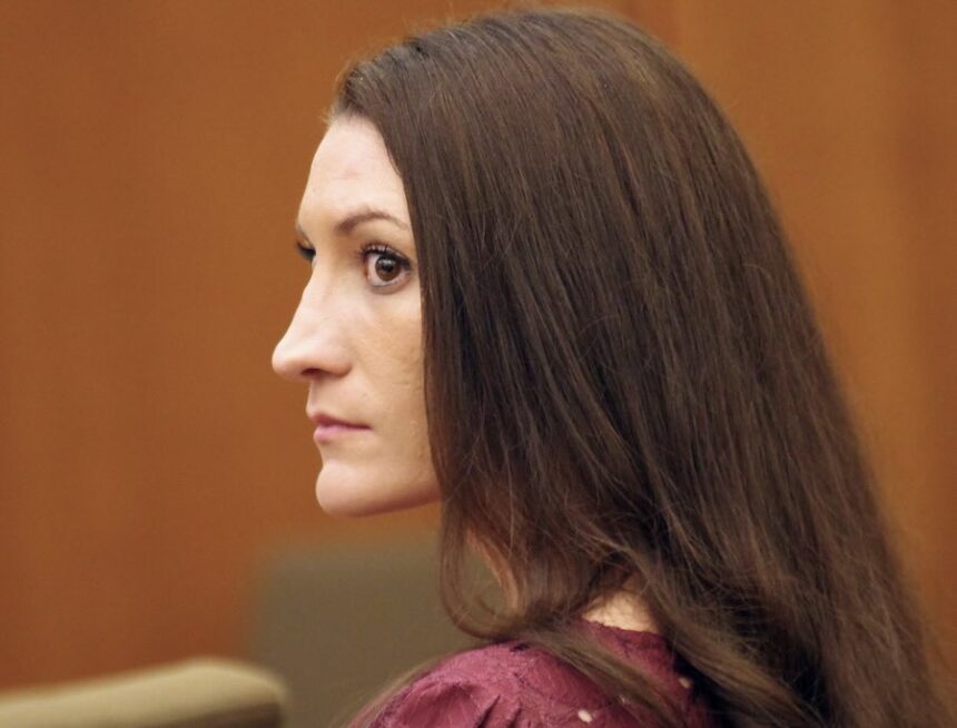 Defendant Lindsay Clancy watches as her attorney Kevin Reddington prepares to question a witness during proceedings in her murder trial, Friday, Aug. 21, 2026, in Plymouth, Mass.