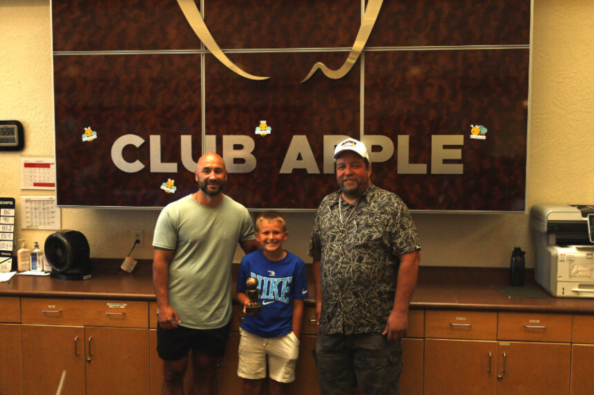 Gifting award to Enoch Harrison, winner of the Knights of Columbus freethrow contest | Rachel Jensen, EastIdahoNews.com