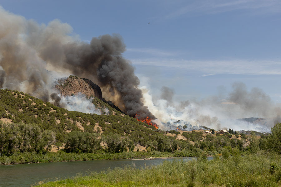 A panorama of the fire burning at Kelly Canyon since Friday evening, totaling over 1,000 acres burned. | Daniel V. Ramirez, EastIdahoNews.com