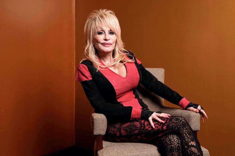 Dolly Parton poses at the Carnegie Medal of Philanthropy Ceremony in New York, on Oct. 13, 2022. | Andres Kudacki, Associated Press