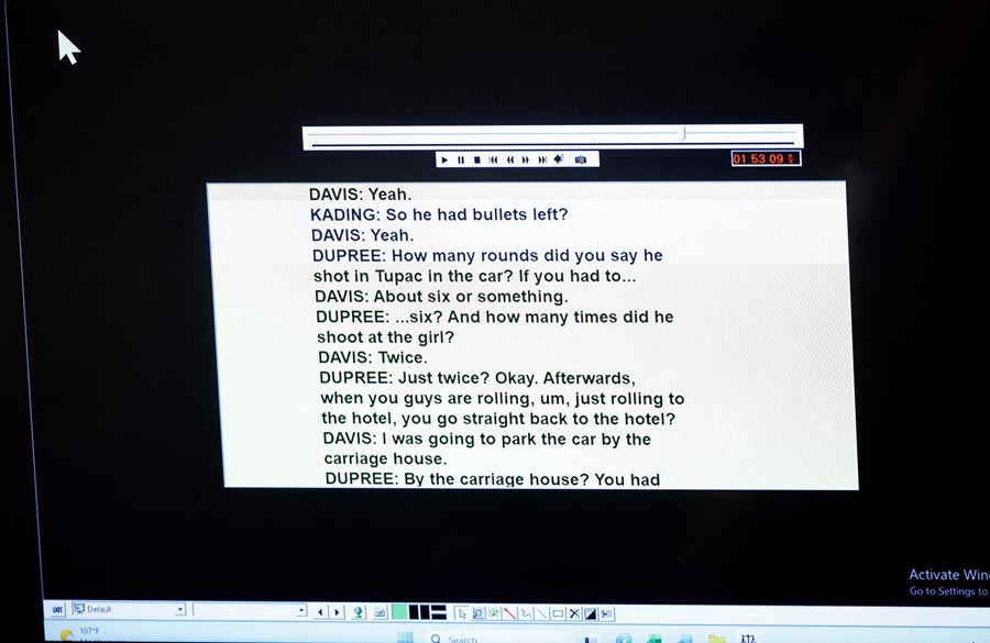 A screen shows a transcript of a 2008 recording of an interview with Duane Davis and law enforcement, as it is played during Davis' murder trial on August 20.