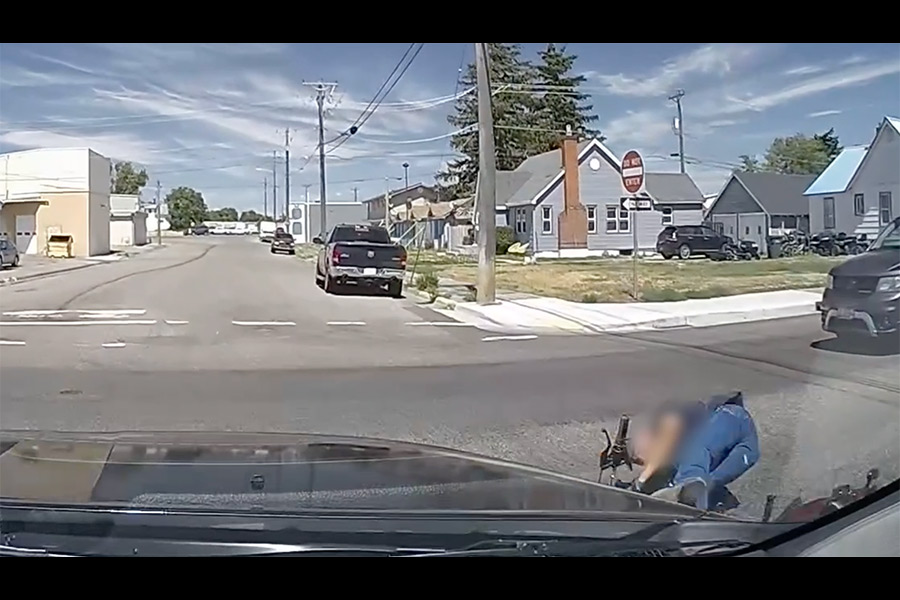 WATCH: Dashcam video shows officer nearly hitting motorcyclist at intersection