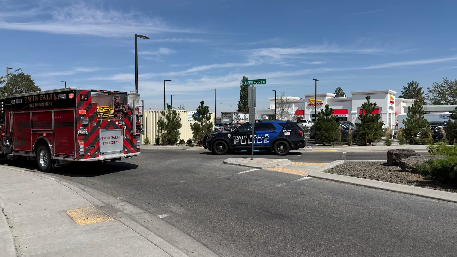 This image provided by KMVT shows the scene of a shooting that started at an In-N-Out Burger restaurant, Saturday, Aug. 1, 2026 in Twin Falls, Idaho.