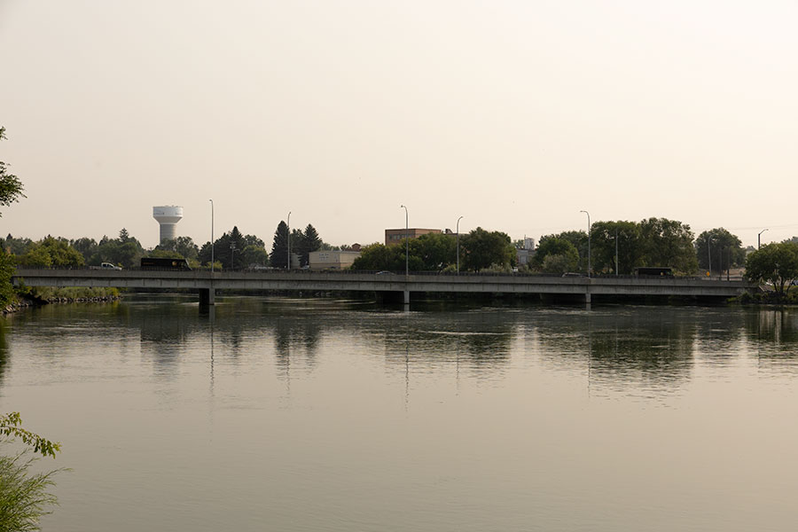 Smokey skies are seen over the Idaho Falls water tower and Snake River, on Thursday, Aug. 6, 2026, in Idaho Falls. Several counties in East Idaho are under an air quality advisory due to wildfire smoke.