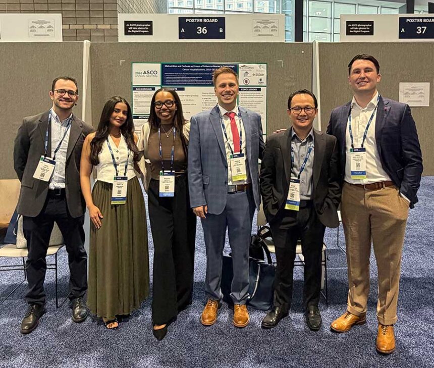 Daniel Thomas Jones, DO, MBA, MHS, with members of his oncology research team at the 2026 ASCO Annual Meeting in Chicago, where the group presented research in cancer outcomes and health services research. | Courtesy of Dr. Jones