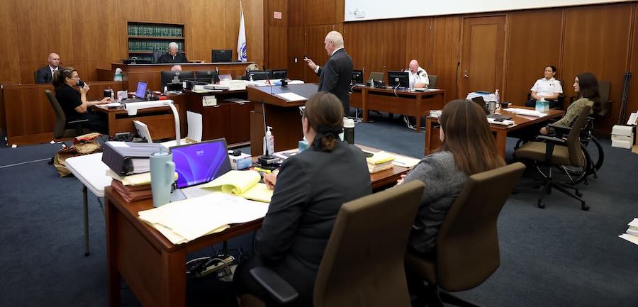 Defense attorney Kevin Reddington, center, questions witness, Mass. State Police Sgt. Dan Lawlor, far left, during Lindsay Clancy's murder trial at Plymouth Superior Court, Wednesday, Aug. 12, 2026, in Plymouth, Mass.