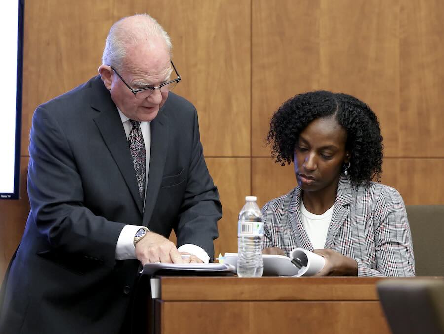 Defense attorney Kevin Reddington, left, clarifies notes with witness Latiesha Dukes, a mental health therapist, during Lindsay Clancy's murder trial at Plymouth Superior Court on Wednesday, Aug. 12, 2026, in Plymouth, Mass.