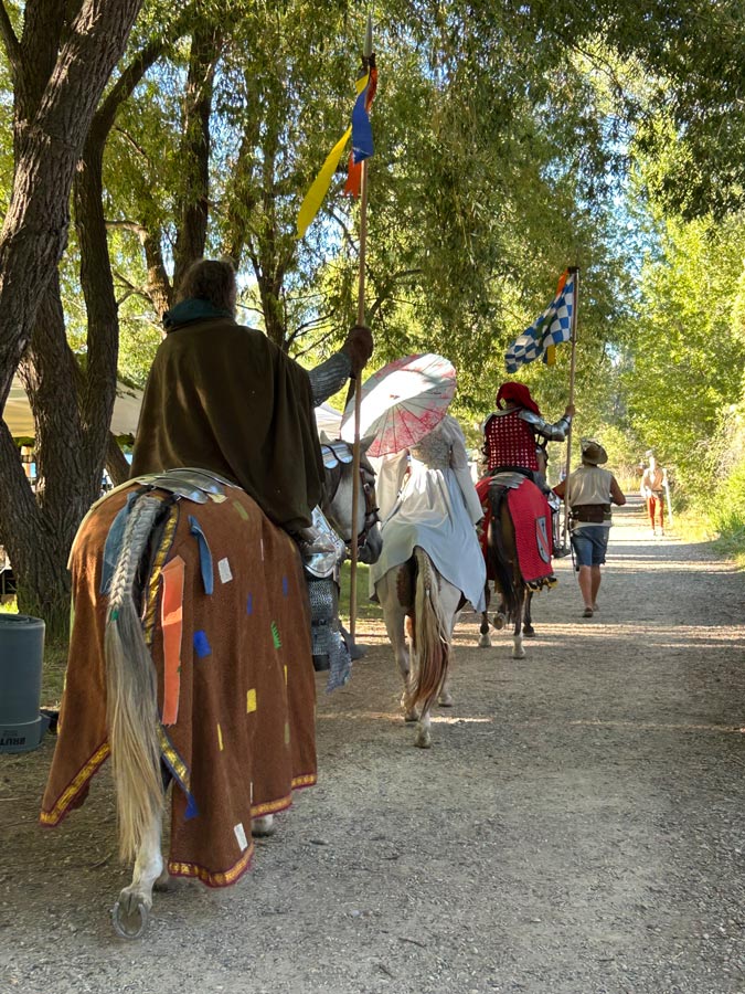 Horsemaster Steve Genetti (back) and some of his troupe members promenade through the Thornshire Renaissance Faire. Courtesy David Miller.