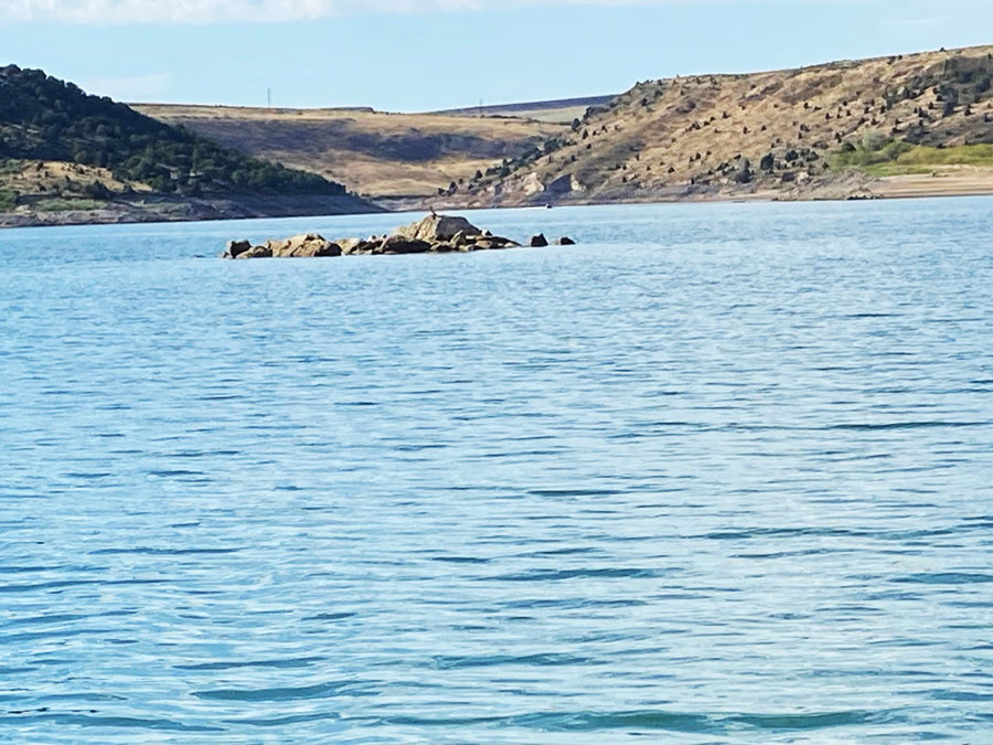The rock island near the Juniper Boat Ramp on Ririe Reservoir indicates that the water level is dropping rapidly. | Bill Schiess, EastIdahoNews.com 