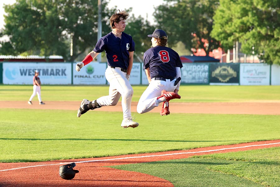 Grays Trayson Kostial (2) and Alex Romriell (8)