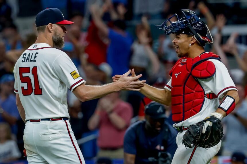 Atlanta Braves pitcher Chris Sale, right, celebrates after winning a baseball game shutout against the Los Angeles Dodgers, Thursday, Aug. 27, 2026, in Atlanta. (AP Photo/Erik S. Lesser)