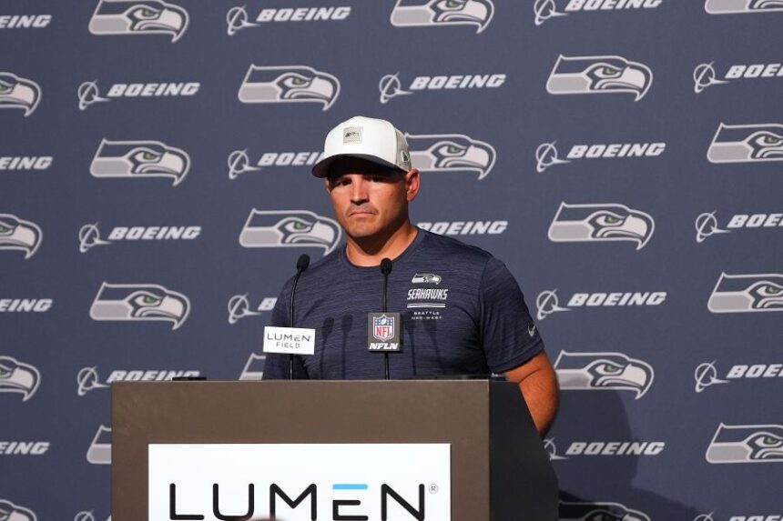 Seattle Seahawks head coach Mike Macdonald speaks during a press availability after the NFL football team's training camp, Saturday, Aug. 8, 2026, in Seattle. (AP Photo/Lindsey Wasson)