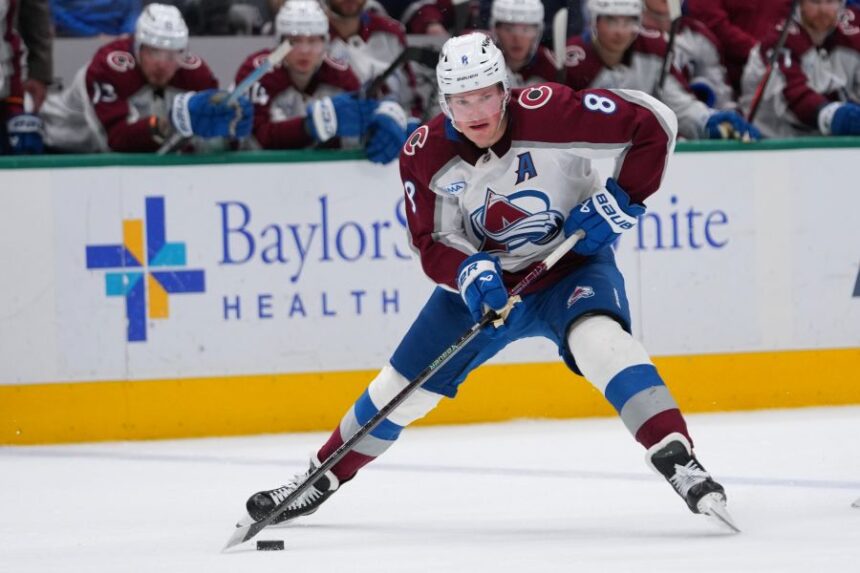 FILE - Colorado Avalanche defenseman Cale Makar skates with the puck during the second period of an NHL hockey game against the Dallas Stars, March 6, 2026, in Dallas. (AP Photo/Julio Cortez, File)