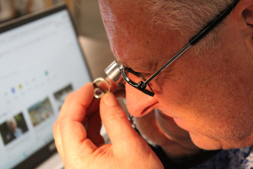 Grant Zahajko appraising a ring at the Museum of Idaho's appraisal event. | Kaitlyn Hart, EastIdahoNews.com